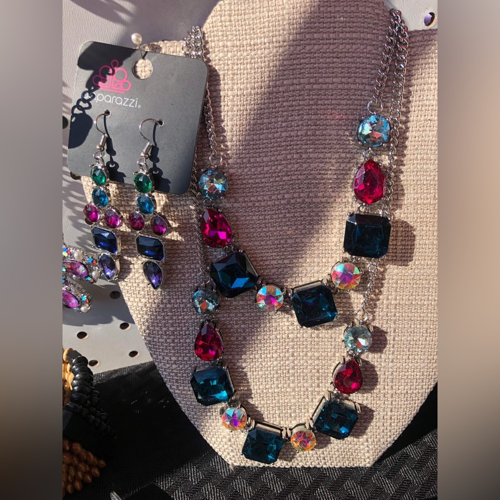 2 necklaces with matching earrings